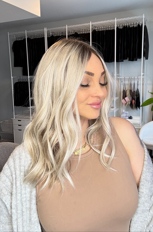 Woman with blonde hair in a salon setting
