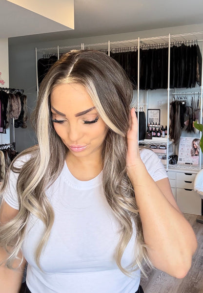 Mannequin wearing a 25‑inch brown‑to‑blonde ombré 13x4 lace front wig.