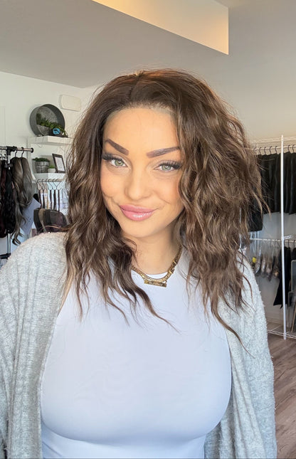 Woman with styled hair in a clothing store