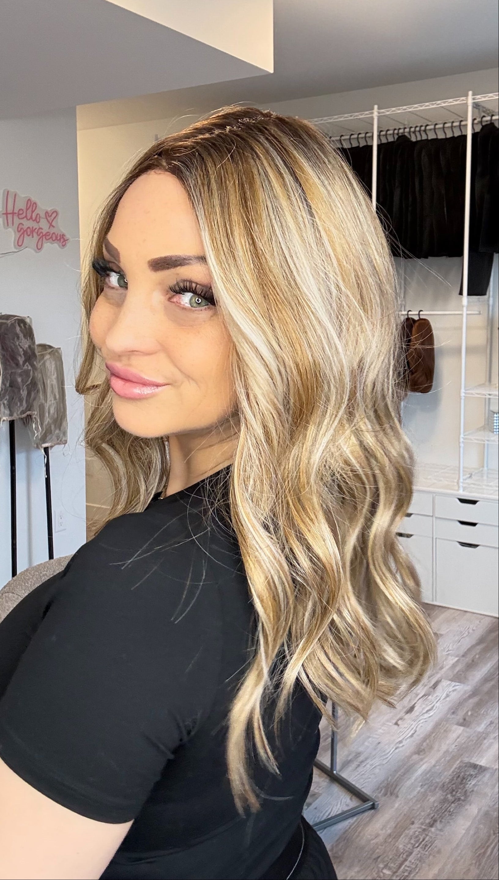 Woman with long blonde hair in a clothing store