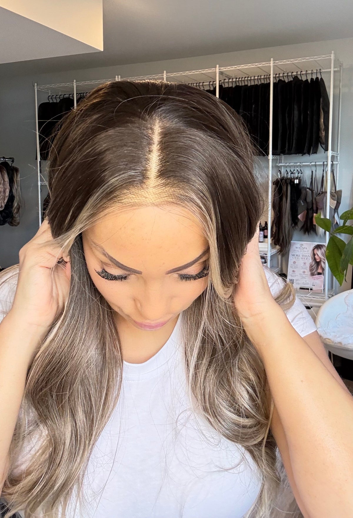 Mannequin wearing a 25‑inch brown‑to‑blonde ombré 13x4 lace front wig.