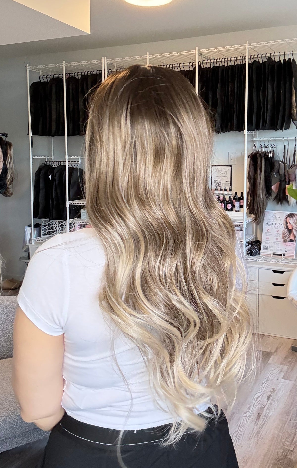 Mannequin wearing a 25‑inch brown‑to‑blonde ombré 13x4 lace front wig.