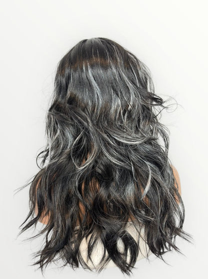 Long, wavy hairpiece with black and gray color on a white background