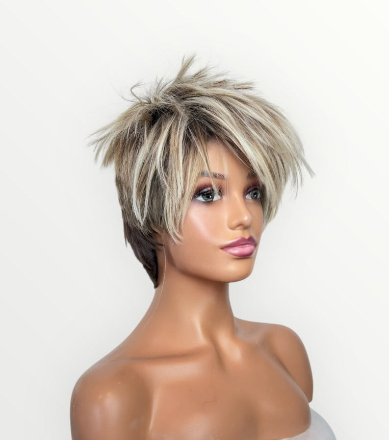 Mannequin head with a short blonde wig on a white background
