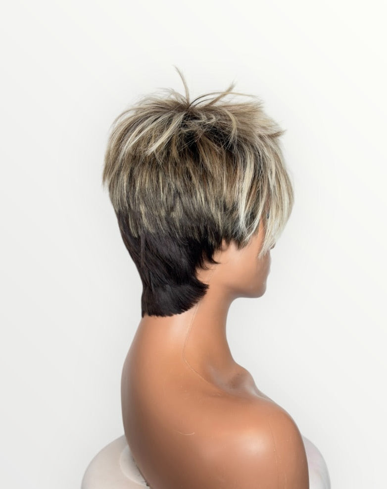 Mannequin head with a short, styled wig on a white background