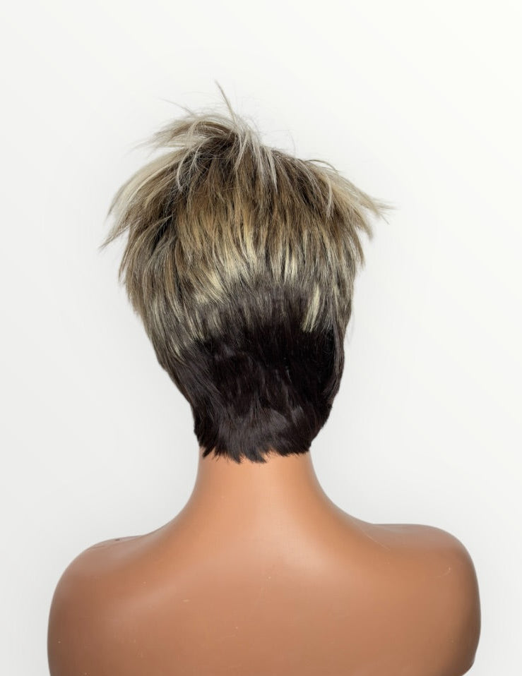 Short, styled wig on a mannequin head against a white background