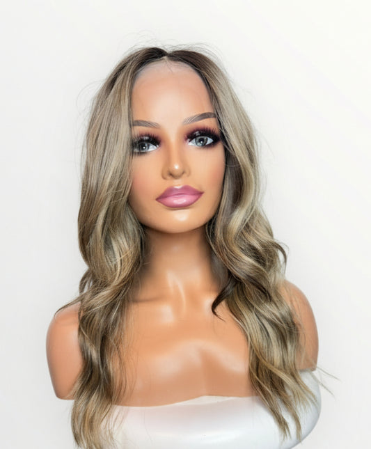 Mannequin head with a wig on a white background