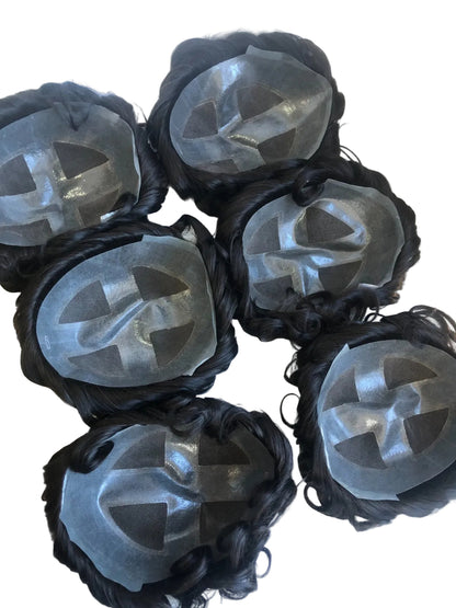 Black hair ties with clear silicone ends on a white surface